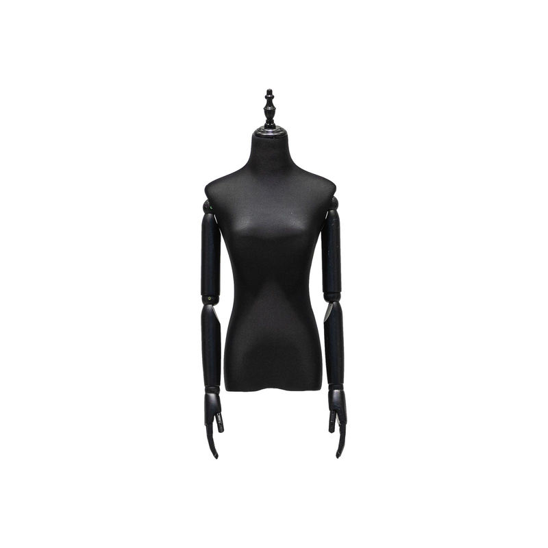 Manichino femminile di cotone con braccia e speciale copricapo esposto in vetrina